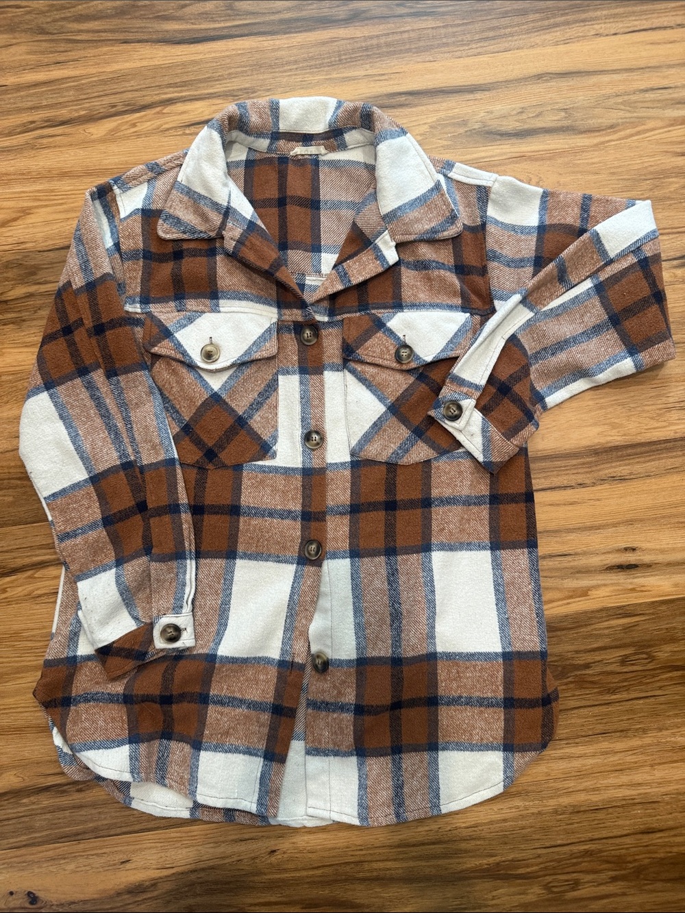 Cute fall button down flannel.